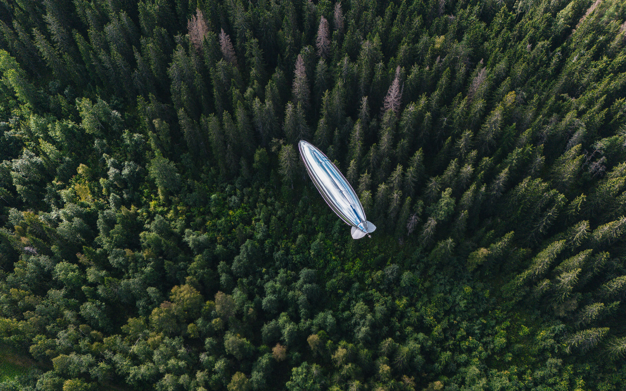 Kelluu autonomous airship over forest
